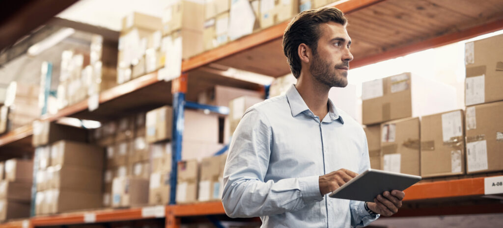 Operations manager inspecting the warehouse and its inventories